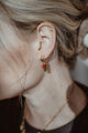 RVS oorringen met yingyang - rood/roze