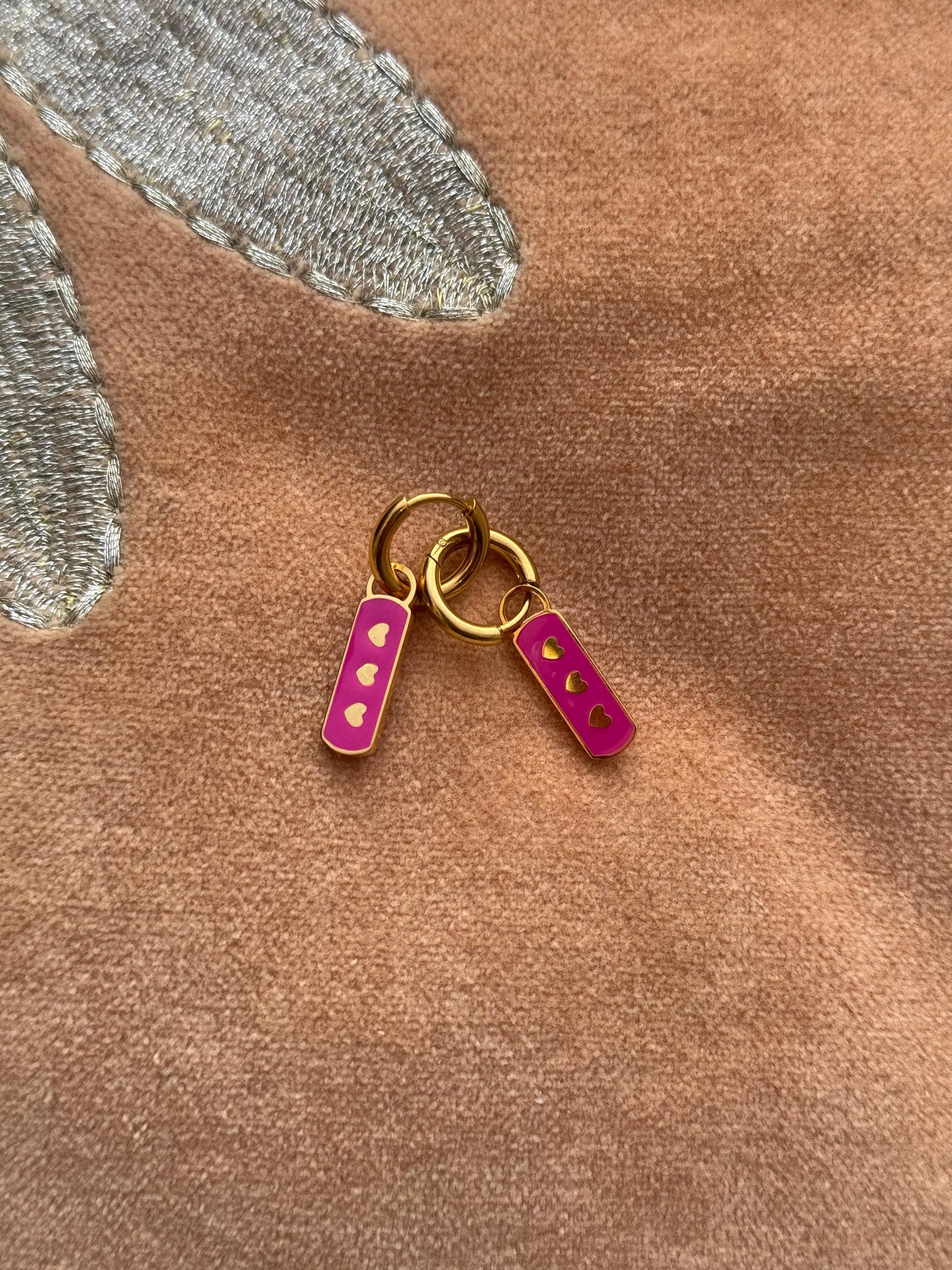 RVS oorbellen met hartje tag - roze/goud
